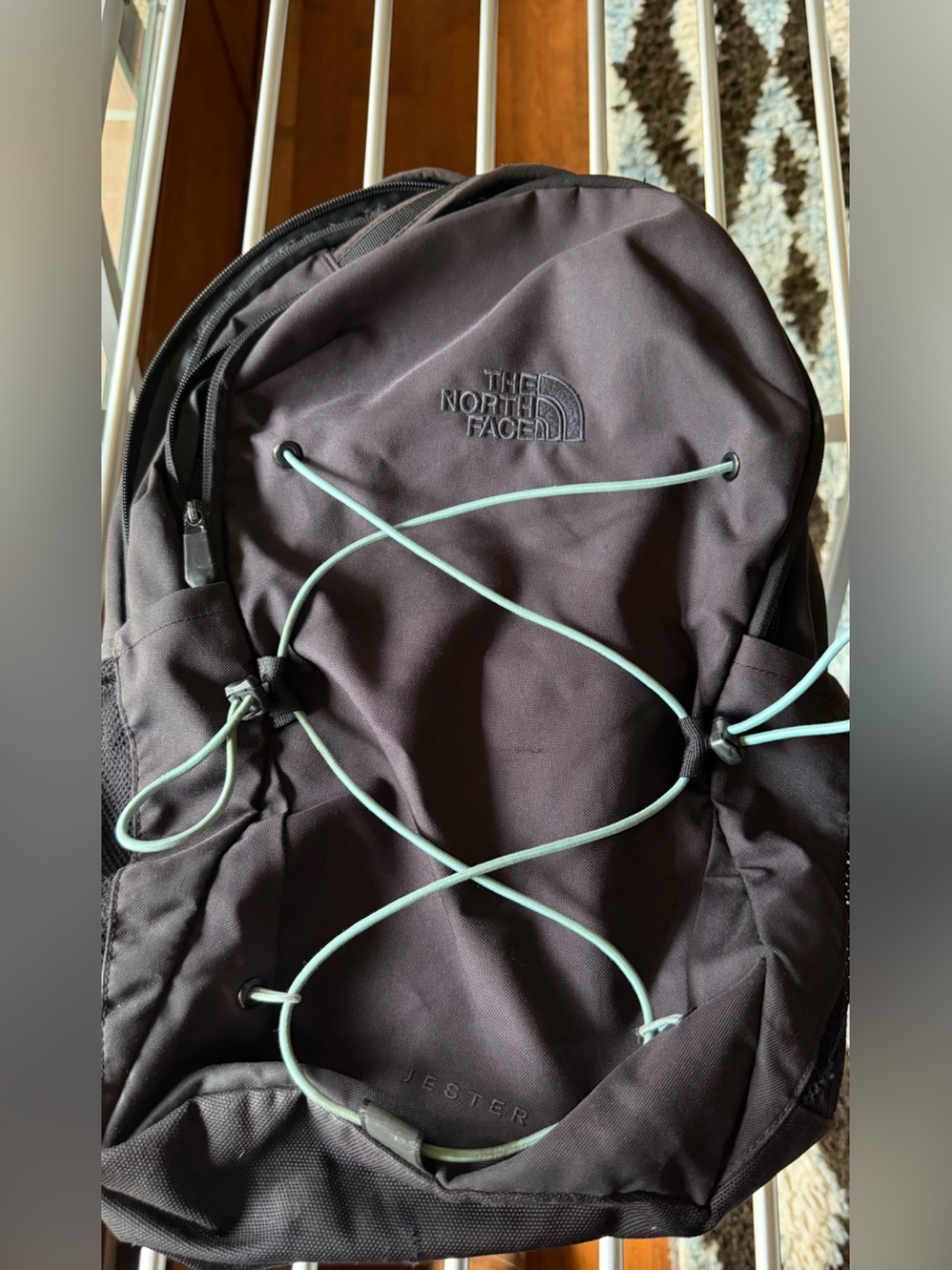 The North Face Black Backpack with Mint Bungee Cord